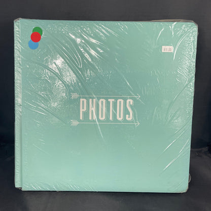 Mint Green Album with print that says "Photos" between 2 arrows pointing to the  right 