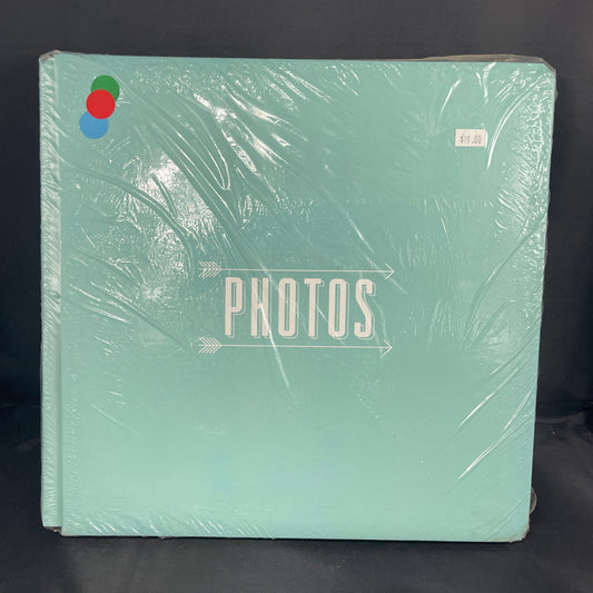 Mint Green Album with print that says "Photos" between 2 arrows pointing to the  right 